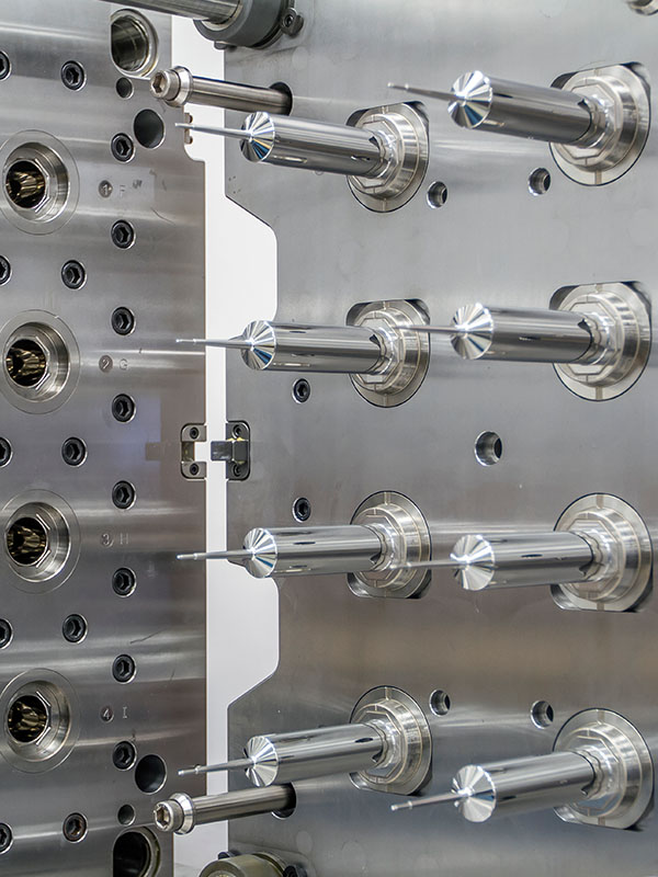 Services_side pictures_plastic injection close up shot of pointy metal molding machine