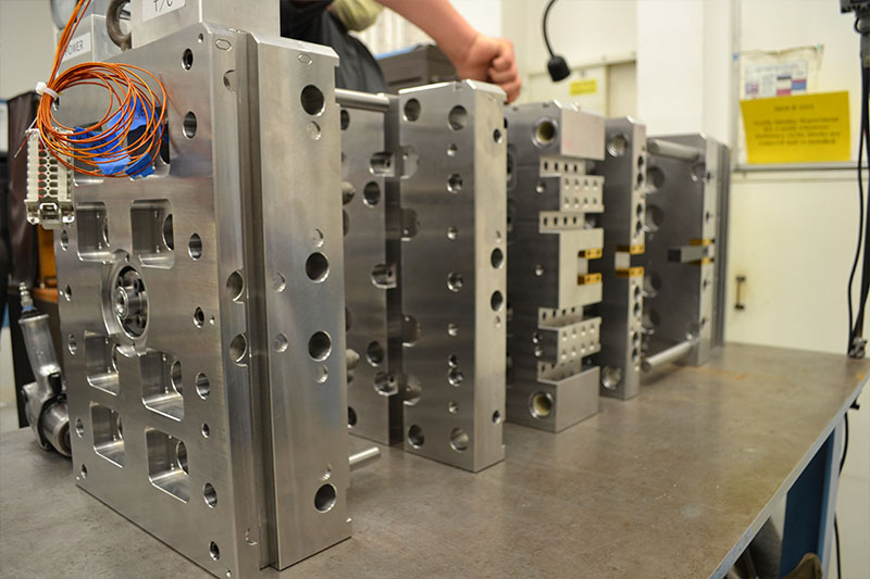 Services_tooling close up of a injection mold machine